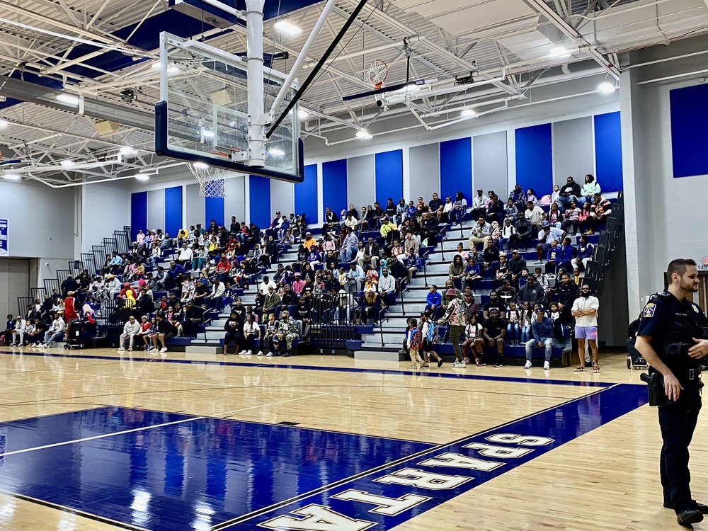 photo of students and fathers in the RHLS Gym