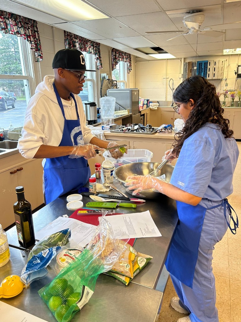 photo of cullinary students preparing meals in the kitchen